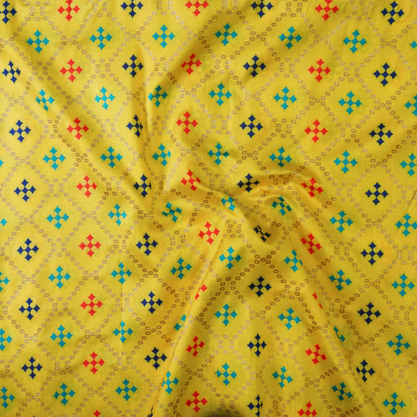 Brocade Yellow With Blue Tea Red And Gold Patola Woven Fabric