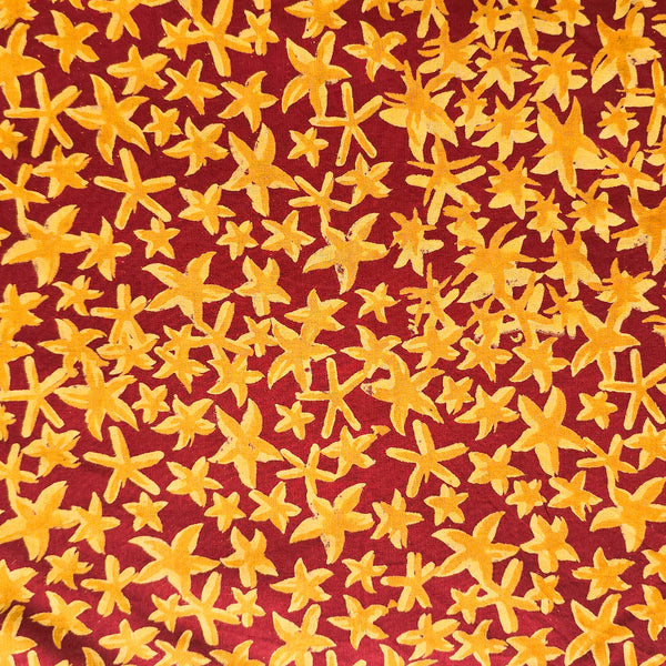 Pure Cotton Discharge Maroon With Yellow Starfish Hand Block Print Fabric