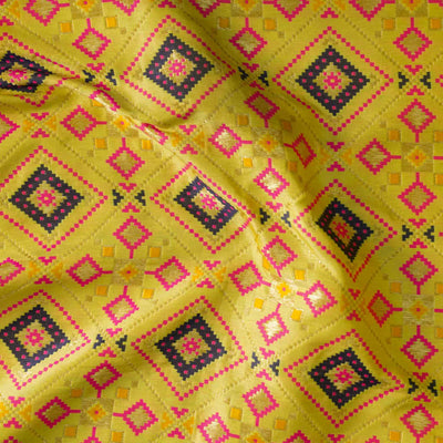 Brocade Yellow With Pink And Navy Blue Intricate Design Hand Woven Fabric
