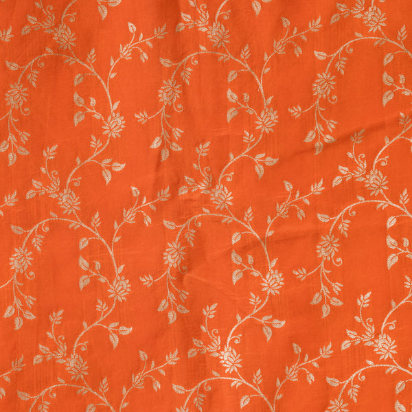 Dola Silk Brocade Orange With Golden Zari Flower Jaal Fabric