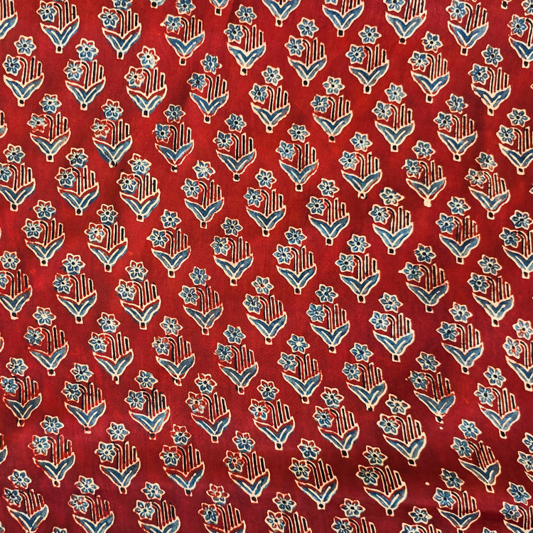 Modal Silk Rust Red With Blue Flower Plants Motif Fabric – Sanskruti