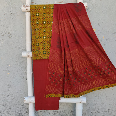 AAHANA - Pure Cotton Ajrak Small Mirror Work Top With Plain Bottom And A Beautiful Printed Dupatta Turmeric Dyed Stars