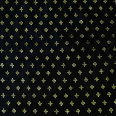 Banarasi Brocade Black With Tiny Gold Four Petal Buttis Woven Fabric